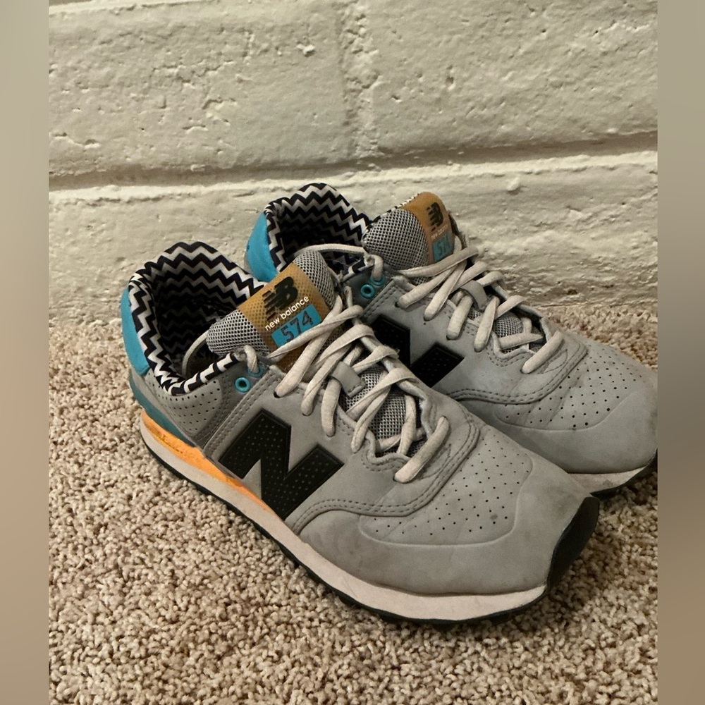 New Balance Gray Sneakers with Black and Orange Highlights